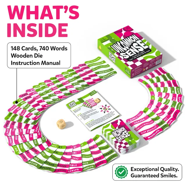 148 cards with 740 words laid out in a curve, the wooden die and the instruction manual