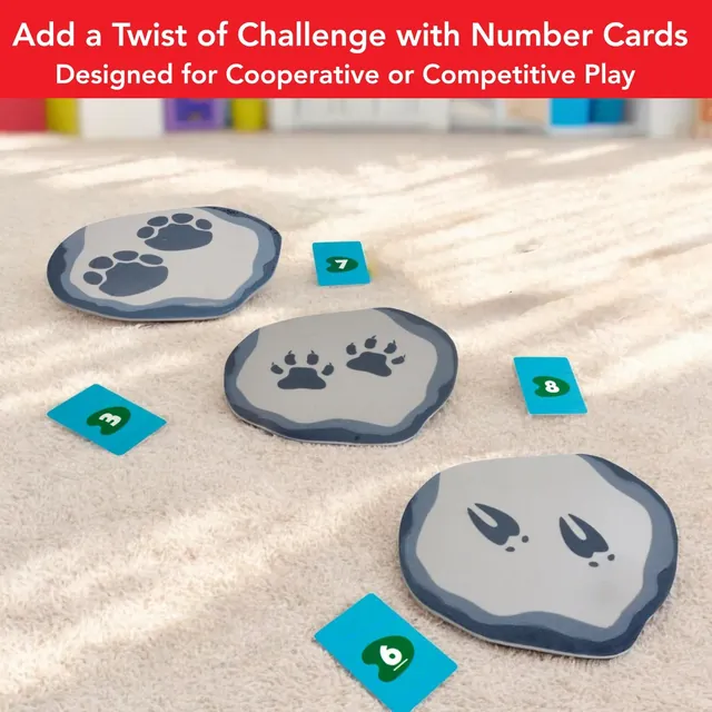 Foam stepping stones with animal footprints and blue number cards on a rug