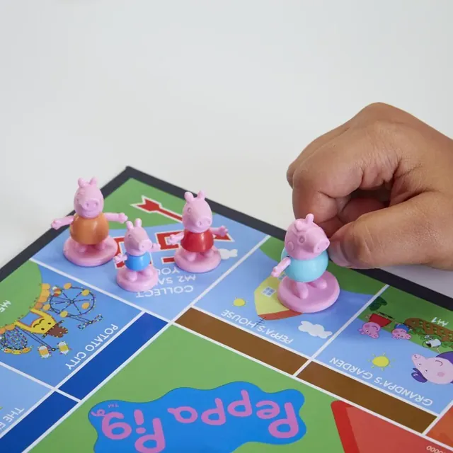 The four Pig family tokens on the board