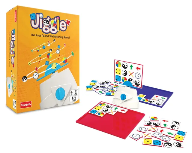 The Jiggle box beside its clockwork stand, a red tray, a blue tray and picture tiles