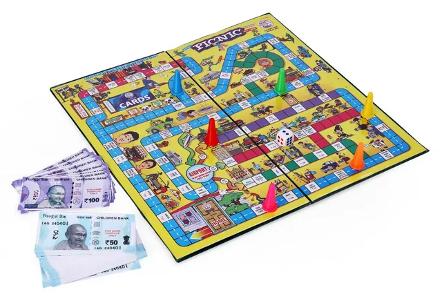 The Picnic board with coloured tokens, a die and stacks of play money