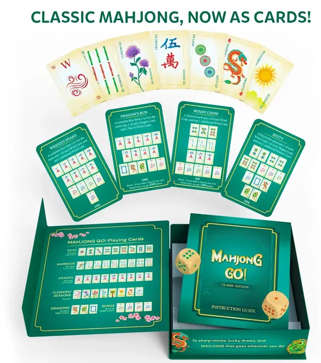Mahjong cards fanned above green South Round cards and the open box