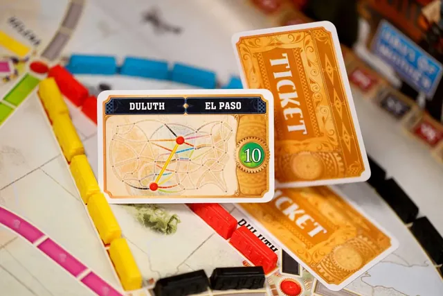 A Duluth to El Paso destination ticket worth 10 points lying on the board