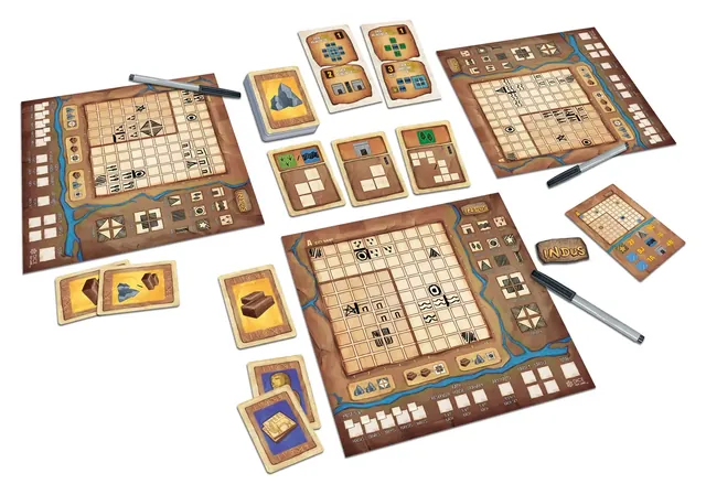 A render of a game laid out: map sheets around a market of cards, with pens