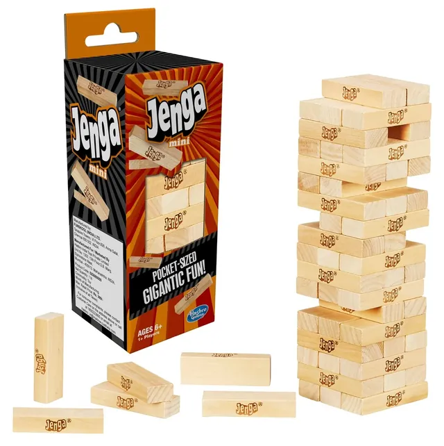 The Jenga Mini box beside a built mini tower and loose blocks