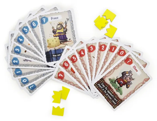 The blue and red cards fanned out with yellow crown tokens