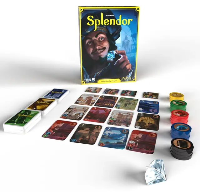 Splendor's contents laid out: rows of development cards, gem tokens in six colours and the box