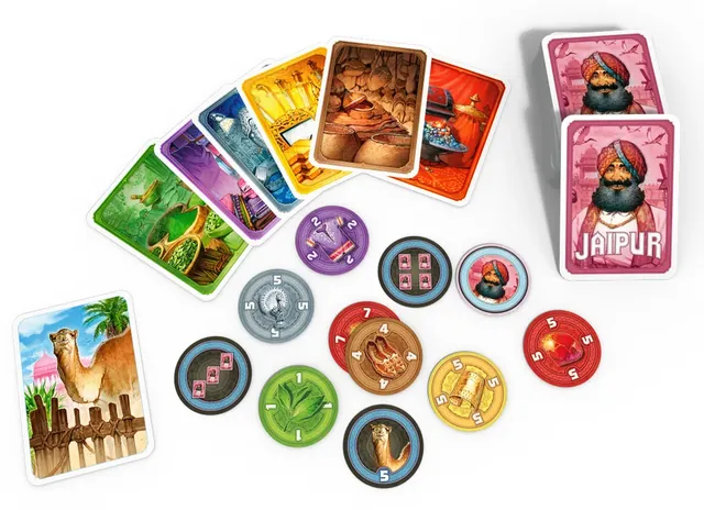 Jaipur's contents: goods cards, camel cards and round tokens laid out
