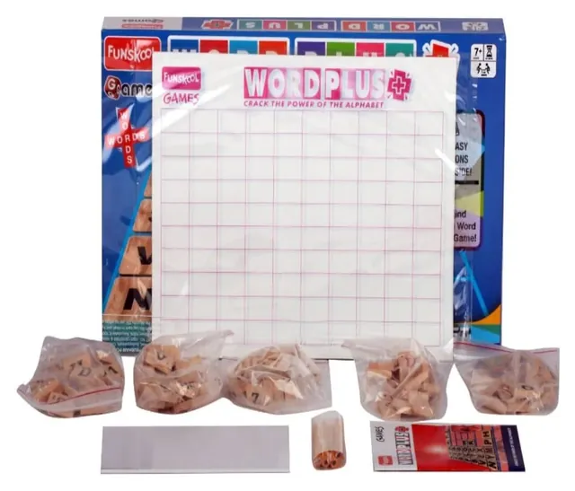 The open Word Plus box with a tile mat, bags of letter tiles, a notepad and pencils