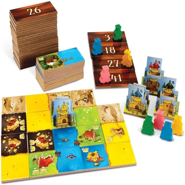 Kingdomino land tiles, numbered tile backs, wooden kings and a cardboard castle