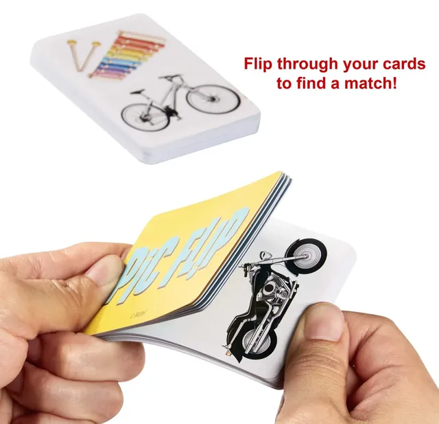 A hand flipping through a thick Pic Flip deck to a card showing a motorbike