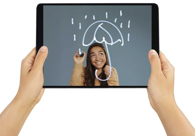 Hands holding a tablet that shows a woman under an umbrella she has drawn in the air