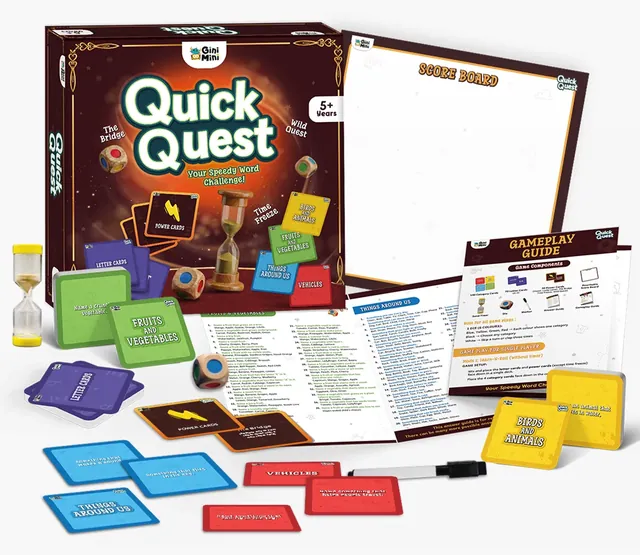 The box, category and letter cards, power cards, the sand timer, a die and the wipe-clean score card laid out