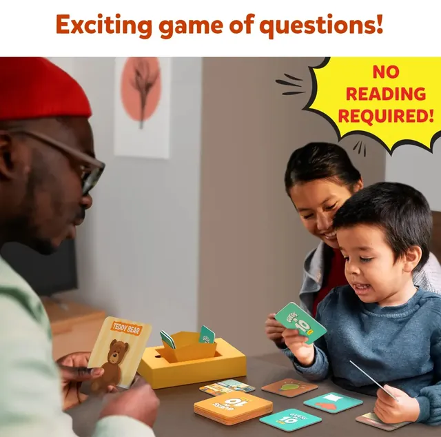 A father, a mother and their son playing with the cards and guider tiles