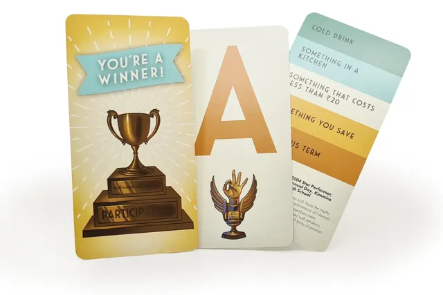 The You're a winner participation card, a letter A card and a topic card