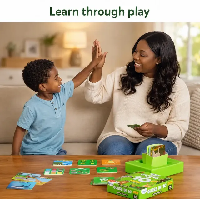 A mother and her son giving each other a high five beside the cards and tiles