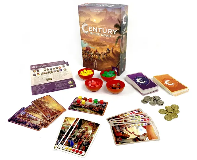 The Century: Spice Road box with spice cubes in bowls, cards and coins