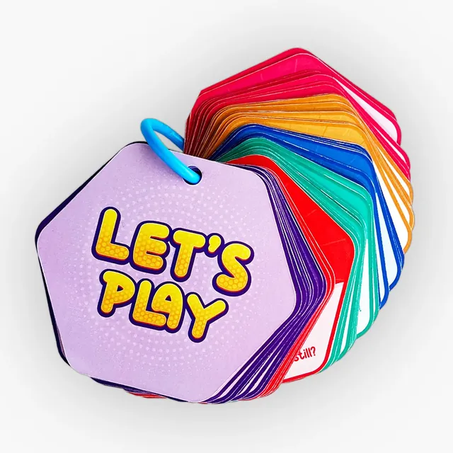 The hexagonal hunt cards held together on their blue clip, with a 'Let's play' card on top