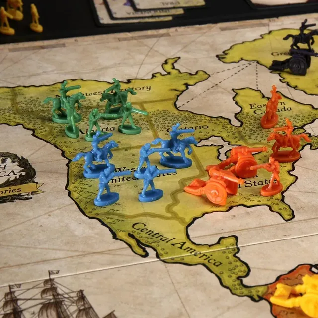 Blue, green and orange armies spread across North America on the Risk map