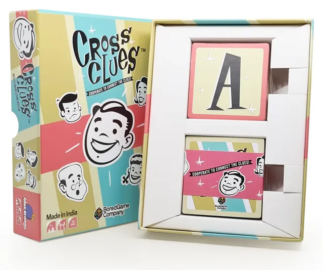 The box standing open with letter tiles and cards inside the tray