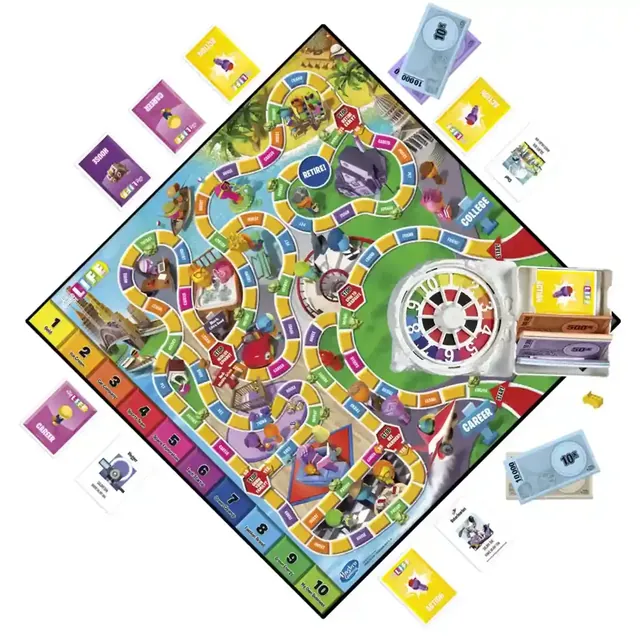 The Game of Life board with its spinner, cars, pegs, cards and money spread around it