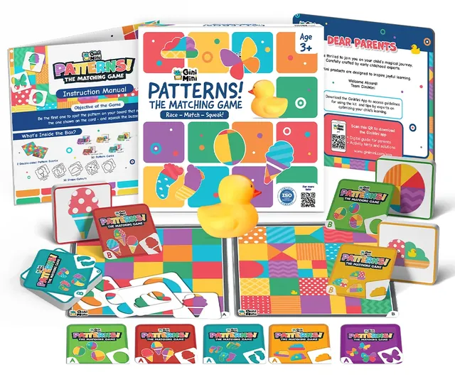 The instruction manual, the box, two patterned boards, pattern cards and the squeaky buzzer