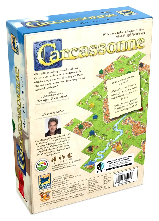 The back of the box with tiles showing roads and cities, a photo of the designer and the contents