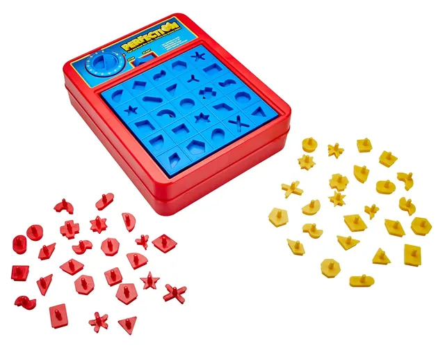 The empty tray with a set of red shapes and a set of yellow shapes beside it
