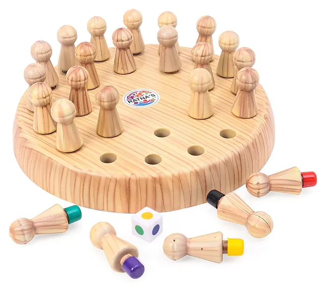 The round board with pale pawns standing in its holes and a few lying beside it with coloured bases