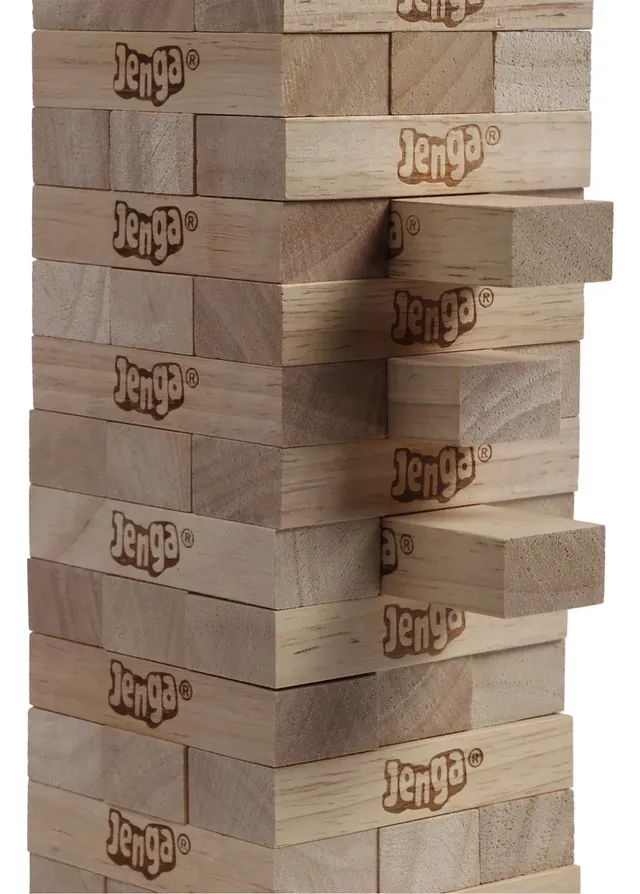 Blocks pulled halfway out of a Jenga tower