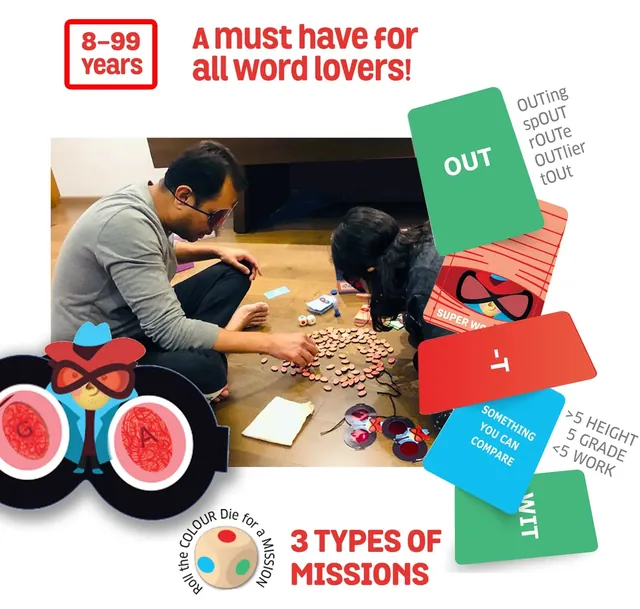 Two players sorting letter tokens on the floor, with sample mission cards and decoder glasses