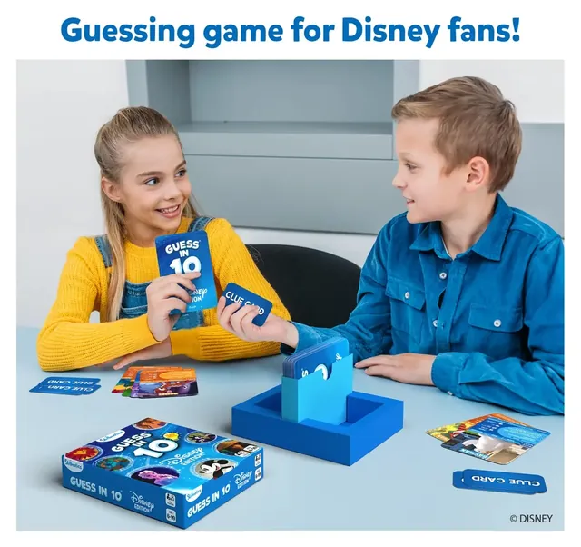 Two children at a table playing with Disney cards held in a blue card holder
